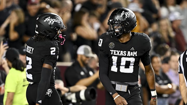 Oct 26, 2024; College Station, Texas, USA; Texas A&M Aggies quarterback Marcel Reed (10) celebrates after scoring a touchdown in the fourth quarter against the LSU Tigers at Kyle Field. Mandatory Credit: Maria Lysaker-Imagn Images. 