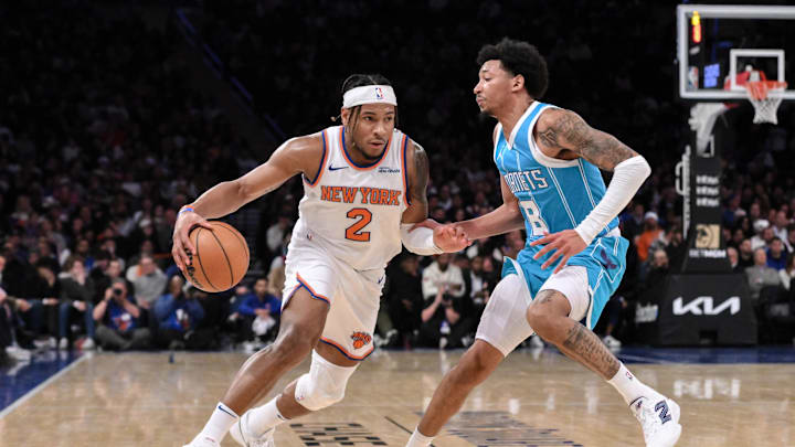 Dec 5, 2024; New York, New York, USA; New York Knicks guard Miles McBride (2) drives to the basket while being defended by Charlotte Hornets guard Nick Smith Jr. (8) during the second half at Madison Square Garden. Mandatory Credit: John Jones-Imagn Images Dec 5, 2024; New York, New York, USA; New York Knicks guard Miles McBride (2) drives to the basket while being defended by Charlotte Hornets guard Nick Smith Jr. (8) during the second half at Madison Square Garden. Mandatory Credit: John Jones-Imagn Images