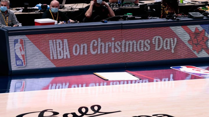 Dec 25, 2020; Denver, Colorado, USA; NBA on Christmas Day is displayed across the sideboards in the first quarter of the game between the Denver Nuggets and the Los Angeles Clippers at Ball Arena. Mandatory Credit: Isaiah J. Downing-USA TODAY Sports Dec 25, 2020; Denver, Colorado, USA; NBA on Christmas Day is displayed across the sideboards in the first quarter of the game between the Denver Nuggets and the Los Angeles Clippers at Ball Arena. Mandatory Credit: Isaiah J. Downing-USA TODAY Sports