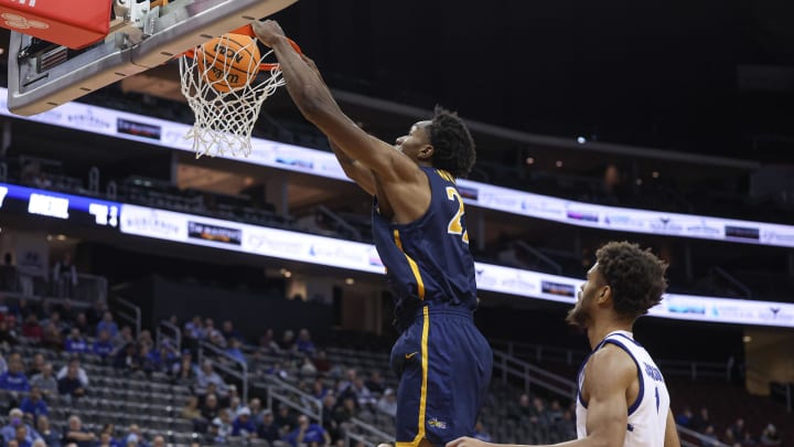 Dec 14, 2022; Newark, New Jersey, USA; Drexel Dragons forward Amari Williams (22) dunks the ball during the first half in front of Seton Hall Pirates forward Tray Jackson (1) at Prudential Center. Mandatory Credit: Vincent Carchietta-USA TODAY Sports