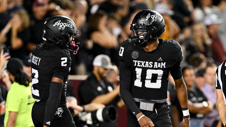 Oct 26, 2024; College Station, Texas, USA; Texas A&M Aggies quarterback Marcel Reed (10) celebrates after scoring a touchdown in the fourth quarter against the LSU Tigers at Kyle Field. Mandatory Credit: Maria Lysaker-Imagn Images.