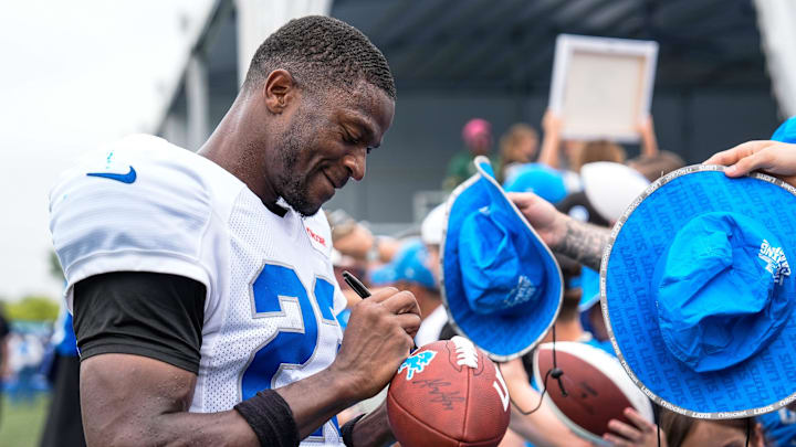 Detroit Lions cornerback Rock Ya-Sin (23) signs autographs for fans after practice during training camp at Meijer Performance Center in Allen Park on Saturday, July 26, 2025.