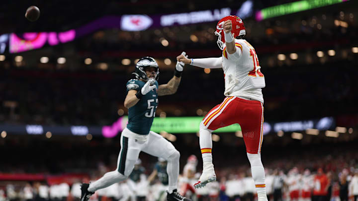 Feb 9, 2025; New Orleans, LA, USA; Kansas City Chiefs quarterback Patrick Mahomes (15) passes the ball from his own end zone as Philadelphia Eagles linebacker Zack Baun (53) chases during Super Bowl LIX at Caesars Superdome. Mandatory Credit: Geoff Burke-Imagn Images