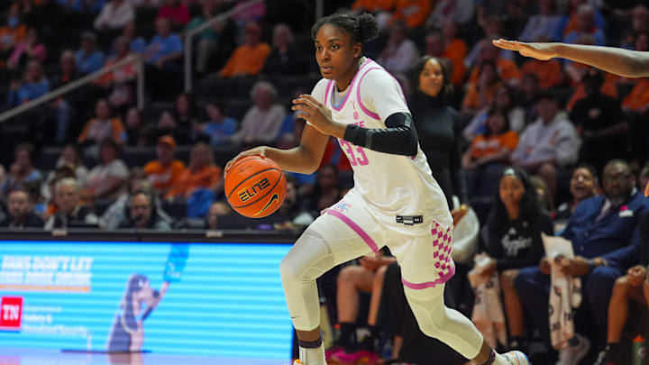 Tennessee forward Alyssa Latham (33) dribbles the ball during a NCAA basketball game at Thompson-Boling Arena at Food City Center in Knoxville, Tenn., on Feb. 19, 2026.