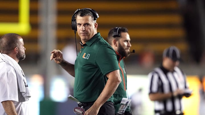 Oct 5, 2024; Berkeley, California, USA; Miami Hurricanes head coach Mario Cristobal walks on the field during the second quarter against the California Golden Bears at California Memorial Stadium. Mandatory Credit: Darren Yamashita-Imagn Images