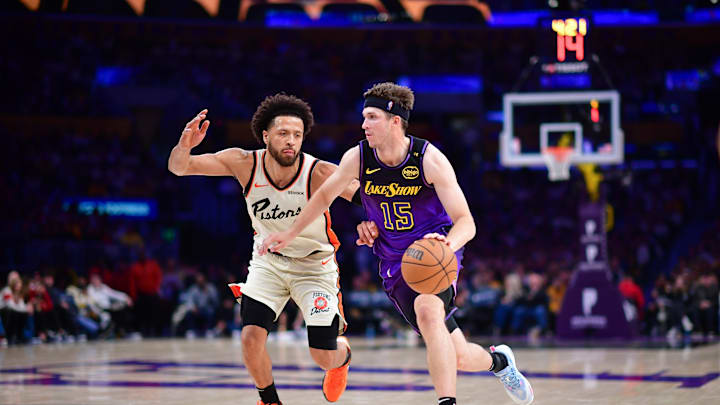 Dec 23, 2024; Los Angeles, California, USA; Los Angeles Lakers guard Austin Reaves (15) moves the ball against Detroit Pistons guard Cade Cunningham (2) during the second half at Crypto.com Arena. Mandatory Credit: Gary A. Vasquez-Imagn Images Dec 23, 2024; Los Angeles, California, USA; Los Angeles Lakers guard Austin Reaves (15) moves the ball against Detroit Pistons guard Cade Cunningham (2) during the second half at Crypto.com Arena. Mandatory Credit: Gary A. Vasquez-Imagn Images