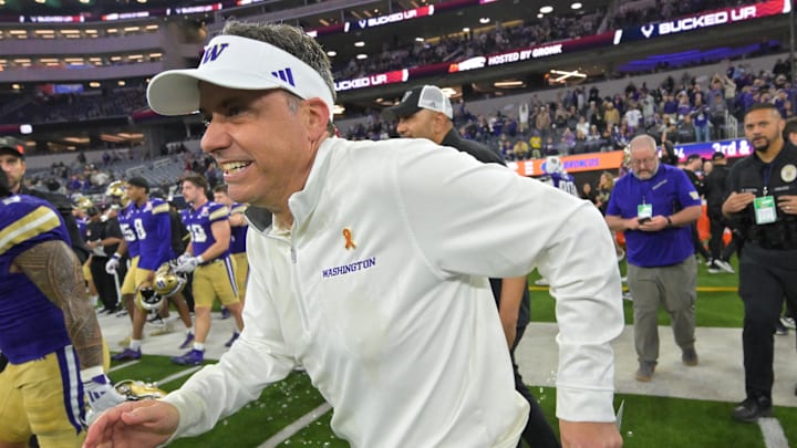 Dec 13, 2025; Inglewood, CA, USA; Washington Huskies head coach Jedd Fisch runs on to the field after defeating the Boise State Broncos in the LA Bowl at SoFi Stadium. Mandatory Credit: Jayne Kamin-Oncea-Imagn Images Dec 13, 2025; Inglewood, CA, USA; Washington Huskies head coach Jedd Fisch runs on to the field after defeating the Boise State Broncos in the LA Bowl at SoFi Stadium. Mandatory Credit: Jayne Kamin-Oncea-Imagn Images