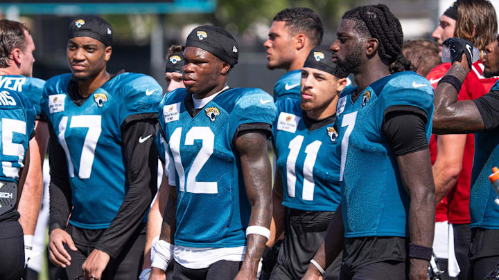 Jacksonville Jaguars wide receivers Cam Camper (17), Travis Hunter (12), Parker Washington (11) and Brian Thomas Jr. (7), walk off the field during an NFL training camp session ten at the Miller Electric Center, Tuesday, Aug. 5, 2025, in Jacksonville, Fla. [Doug Engle/Florida Times-Union]