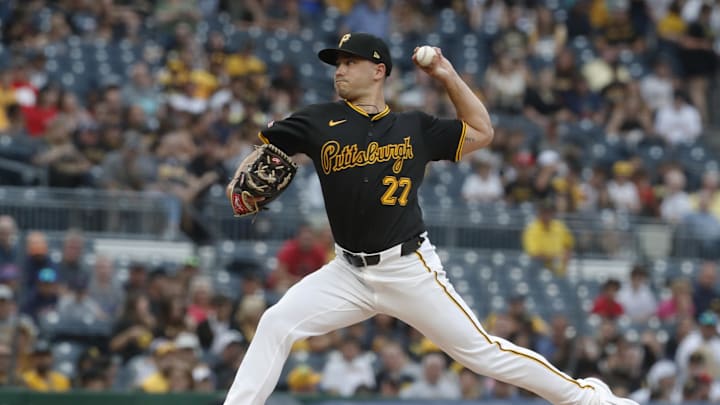 Aug 7, 2024; Pittsburgh, Pennsylvania, USA;  Pittsburgh Pirates starting pitcher Marco Gonzales (27) delivers a pitch against the San Diego Padres during the first inning at PNC Park. 