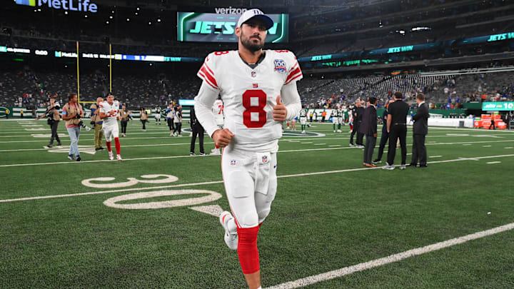 Aug 24, 2024; East Rutherford, New Jersey, USA; New York Giants quarterback Daniel Jones (8) jogs off the field following the game against the New York Jets at MetLife Stadium. Mandatory Credit: Rich Barnes-Imagn Images