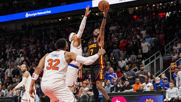 Apr 6, 2026; Atlanta, Georgia, USA; Atlanta Hawks guard Nickeil Alexander-Walker (7) shoots over New York Knicks guard Josh Hart (3) during the second half at State Farm Arena. Mandatory Credit: Dale Zanine-Imagn Images