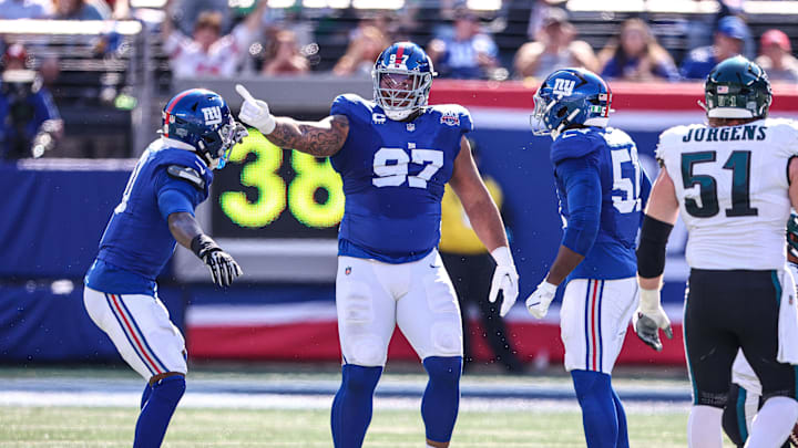Oct 20, 2024; East Rutherford, New Jersey, USA; New York Giants defensive tackle Dexter Lawrence II (97) celebrates after a sack during the first half against the Philadelphia Eagles at MetLife Stadium. Oct 20, 2024; East Rutherford, New Jersey, USA; New York Giants defensive tackle Dexter Lawrence II (97) celebrates after a sack during the first half against the Philadelphia Eagles at MetLife Stadium.