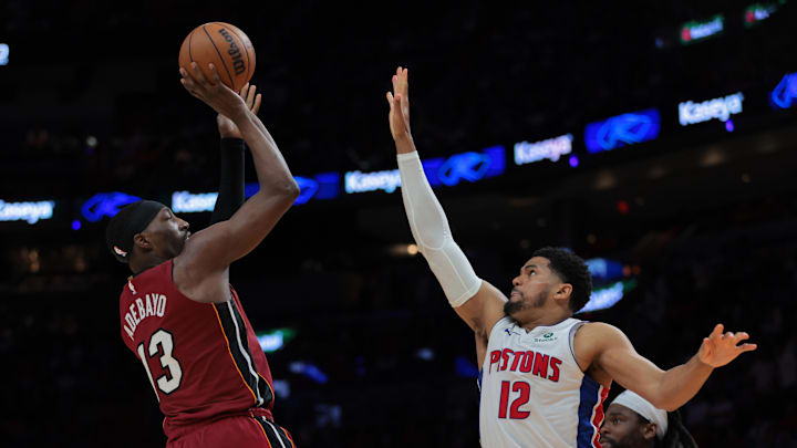 Mar 19, 2025; Miami, Florida, USA; Miami Heat center Bam Adebayo (13) shoots the basketball over Detroit Pistons forward Tobias Harris (12) during the second quarter at Kaseya Center. Mandatory Credit: Sam Navarro-Imagn Images
