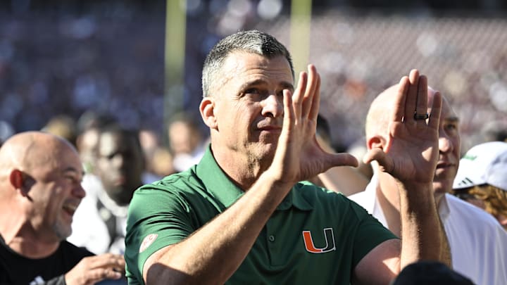 Dec 20, 2025; College Station, TX, USA; Miami Hurricanes head coach Mario Cristobal celebrates after defeating the Texas A&M Aggies in the first round game of the CFP National Playoff at Kyle Field. Mandatory Credit: Jerome Miron-Imagn Images