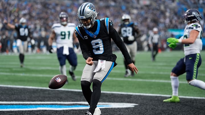 Dec 28, 2025; Charlotte, North Carolina, USA;  Carolina Panthers quarterback Bryce Young (9) runs in for a score against the Seattle Seahawks during the second half at Bank of America Stadium. Mandatory Credit: Jim Dedmon-Imagn Images