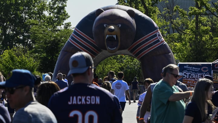 Fans filter into the Bears training camp. The supply of tickets for this year's open practices quickly disappeared.
