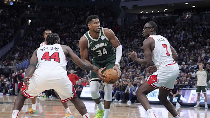 Oct 25, 2024; Milwaukee, Wisconsin, USA; Milwaukee Bucks forward Giannis Antetokounmpo (34) drives against Chicago Bulls forward Jalen Smith (7) and Chicago Bulls forward Patrick Williams (44) in the second half at Fiserv Forum. Mandatory Credit: Michael McLoone-Imagn Images Oct 25, 2024; Milwaukee, Wisconsin, USA; Milwaukee Bucks forward Giannis Antetokounmpo (34) drives against Chicago Bulls forward Jalen Smith (7) and Chicago Bulls forward Patrick Williams (44) in the second half at Fiserv Forum. Mandatory Credit: Michael McLoone-Imagn Images