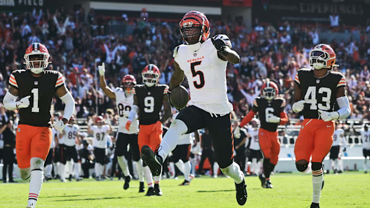 Oct 20, 2024; Cleveland, Ohio, USA; Cincinnati Bengals wide receiver Tee Higgins (5) scores a touchdown during the second half against the Cleveland Browns at Huntington Bank Field. Mandatory Credit: Ken Blaze-Imagn Images