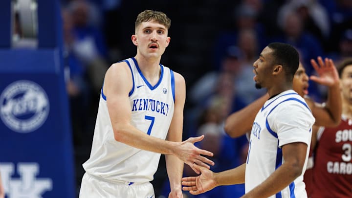 Feb 8, 2025; Lexington, Kentucky, USA; Kentucky Wildcats forward Andrew Carr (7) fives guard Lamont Butler (1) during the first half against the South Carolina Gamecocks at Rupp Arena at Central Bank Center. Mandatory Credit: Jordan Prather-Imagn Images Feb 8, 2025; Lexington, Kentucky, USA; Kentucky Wildcats forward Andrew Carr (7) fives guard Lamont Butler (1) during the first half against the South Carolina Gamecocks at Rupp Arena at Central Bank Center. Mandatory Credit: Jordan Prather-Imagn Images