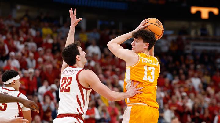 Mar 27, 2026; Chicago, IL, USA; Tennessee Volunteers forward J.P. Estrella (13) looks to pass while defended by Iowa State Cyclones forward Milan Momcilovic (22) in the second half during a Sweet Sixteen game of the Midwest Regional of the men's 2026 NCAA Tournament at United Center. Mandatory Credit: Kamil Krzaczynski-Imagn Images