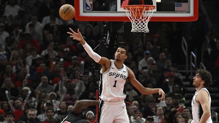 Dec 21, 2023; Chicago, Illinois, USA;  San Antonio Spurs center Victor Wembanyama (1) defends against Chicago Bulls center Andre Drummond (3) during the second half at the United Center. Mandatory Credit: Matt Marton-Imagn Images