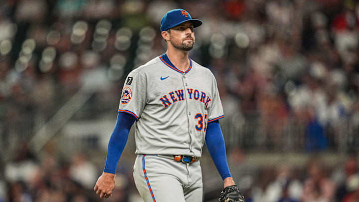 Aug 23, 2025; Cumberland, Georgia, USA; New York Mets starting pitcher Clay Holmes (35) leaves the field after being removed from the game against the Atlanta Braves during the seventh inning at Truist Park. Mandatory Credit: Dale Zanine-Imagn Images Aug 23, 2025; Cumberland, Georgia, USA; New York Mets starting pitcher Clay Holmes (35) leaves the field after being removed from the game against the Atlanta Braves during the seventh inning at Truist Park. Mandatory Credit: Dale Zanine-Imagn Images