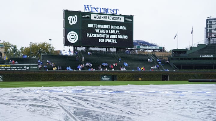 Sep 22, 2024; Chicago, Illinois, USA; Rain delay at Wrigley Field in a game between the Chicago Cubs and the Washington Nationals. Mandatory Credit: David Banks-Imagn Images