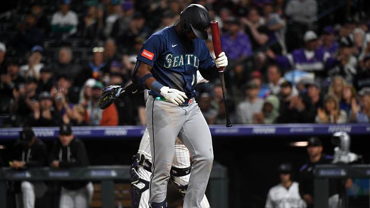 Sep 19, 2026; Denver, Colorado, USA; Seattle Mariners outfielder Lazaro Montes (99) hits his helmet after striking out in the ninth inning against the Colorado Rockies at Coors Field. Mandatory Credit: Christopher Hanewinckel-Imagn Images Sep 19, 2026; Denver, Colorado, USA; Seattle Mariners outfielder Lazaro Montes (99) hits his helmet after striking out in the ninth inning against the Colorado Rockies at Coors Field. Mandatory Credit: Christopher Hanewinckel-Imagn Images