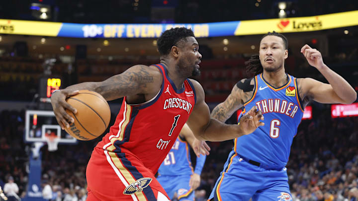 Feb 10, 2025; Oklahoma City, Oklahoma, USA; New Orleans Pelicans forward Zion Williamson (1) drives to the basket beside Oklahoma City Thunder forward Jaylin Williams (6) during the second half at Paycom Center. Mandatory Credit: Alonzo Adams-Imagn Images