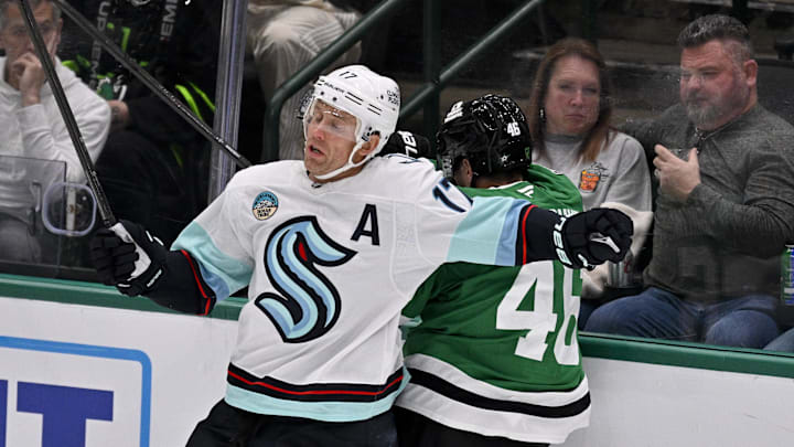 Nov 9, 2025; Dallas, Texas, USA; Seattle Kraken left wing Jaden Schwartz (17) checks Dallas Stars defenseman Ilya Lyubushkin (46) during the first period at the American Airlines Center. Mandatory Credit: Jerome Miron-Imagn Images