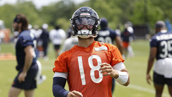 Jun 5, 2024; Lake Forest, IL, USA; Chicago Bears quarterback Caleb Williams (18) warms up during the team's minicamp at Halas Hall. Mandatory Credit: Kamil Krzaczynski-USA TODAY Sports
