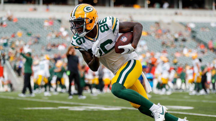 Green Bay Packers wide receiver Grant DuBose (86) runs with the ball during warmups prior to the game against the Cincinnati Bengals at Paycor Stadium during the 2023 preseason. Green Bay Packers wide receiver Grant DuBose (86) runs with the ball during warmups prior to the game against the Cincinnati Bengals at Paycor Stadium during the 2023 preseason.