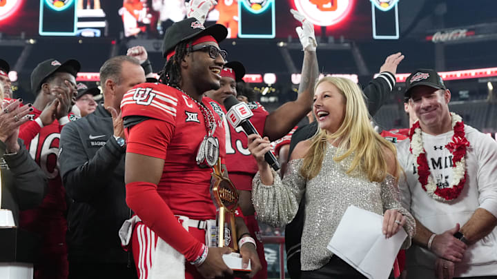Utah Utes quarterback Devon Dampier (4) is interviewed by ESPN reporter Dawn Davenport after victory over Nebraska Cornhuskers in the SRS Distribution Las Vegas Bowl at Allegiant Stadium.