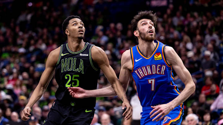 Apr 29, 2024; New Orleans, Louisiana, USA; New Orleans Pelicans guard Trey Murphy III (25) and Oklahoma City Thunder forward Chet Holmgren (7) go for rebounds during game four of the first round for the 2024 NBA playoffs at Smoothie King Center. Mandatory Credit: Stephen Lew-Imagn Images