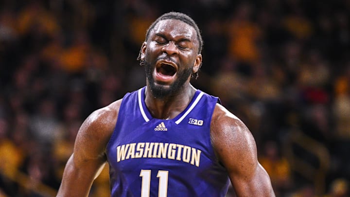 Feb 22, 2025; Iowa City, Iowa, USA; Washington Huskies center Franck Kepnang (11) reacts during the second half against the Iowa Hawkeyes at Carver-Hawkeye Arena. Mandatory Credit: Jeffrey Becker-Imagn Images