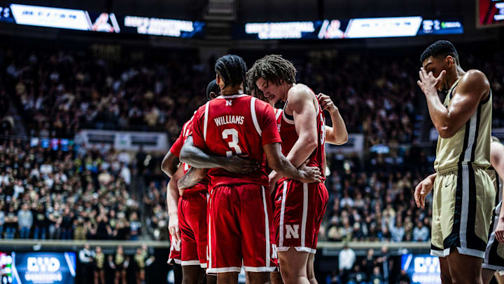Nebraska basketball players, including Brice Williams and Braxton Meah, huddle at Purdue on Jan. 12, 2025.