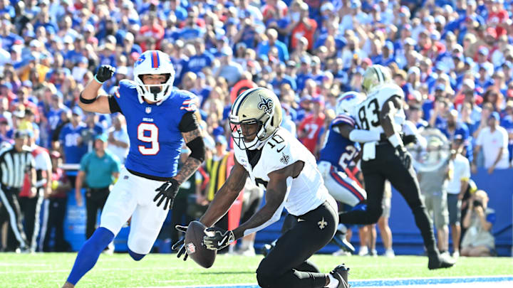Sep 28, 2025; Orchard Park, New York, USA;  New Orleans Saints wide receiver Brandin Cooks (10) drops a pass in the end zone under pressure from Buffalo Bills safety Taylor Rapp (9) during the fourth quarter at Highmark Stadium. Mandatory Credit: Mark Konezny-Imagn Images