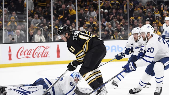 Apr 30, 2024; Boston, Massachusetts, USA; Boston Bruins center Trent Frederic (11) looks for a rebound in front of Toronto Maple Leafs goaltender Joseph Woll (60) during the third period in game five of the first round of the 2024 Stanley Cup Playoffs at TD Garden. Mandatory Credit: Bob DeChiara-Imagn Images