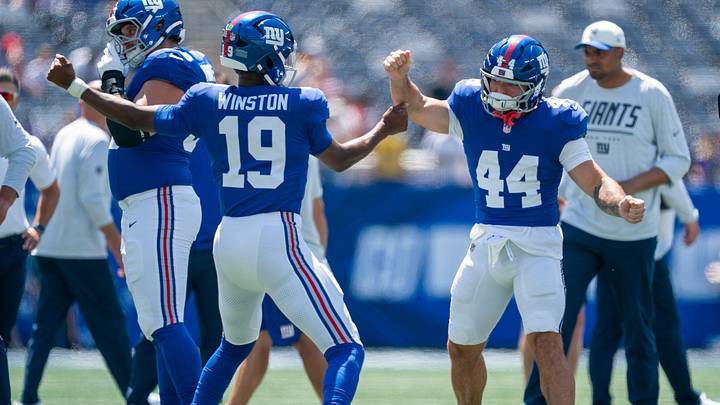 New York Giants quarterback Jameis Winston (19) and New York Giants running back Cam Skattebo (44) 