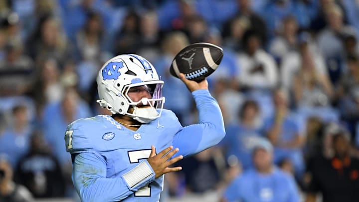 Nov 8, 2025; Chapel Hill, North Carolina, USA; North Carolina Tar Heels quarterback Gio Lopez (7) looks to pass in the second quarter at Kenan Stadium. Mandatory Credit: Bob Donnan-Imagn Images
