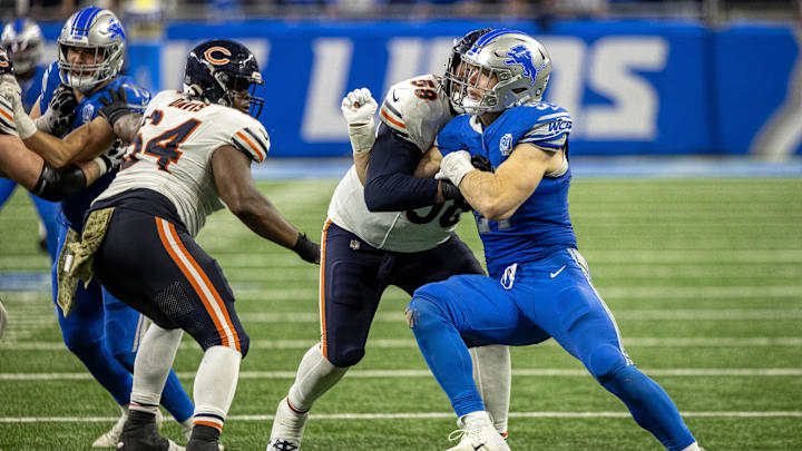 Aidan Hutchinson fights with Darnell Wright to make a strip-sack against the Bears at Ford Field in 2023. Aidan Hutchinson fights with Darnell Wright to make a strip-sack against the Bears at Ford Field in 2023.