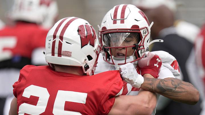 Wisconsin wide receiver Kash Brock (11) and safety Will Mikonowicz (25) are shown during football practice Thursday, August 6, 2026 at Camp Randall Stadium in Madison, Wisconsin.