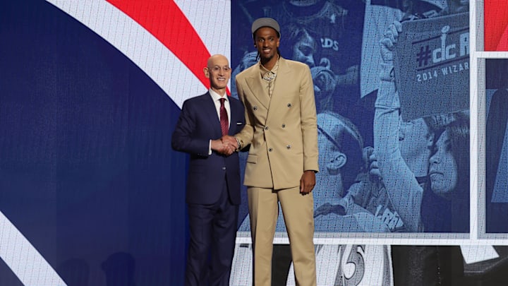 Jun 26, 2024; Brooklyn, NY, USA; Alexander Sarr poses for photos with NBA commissioner Adam Silver after being selected in the first round by the Washington Wizards in the 2024 NBA Draft at Barclays Center. Mandatory Credit: Brad Penner-Imagn Images