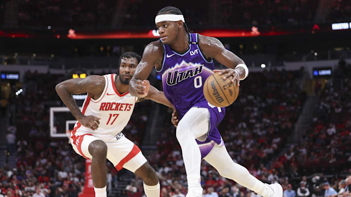 Oct 8, 2025; Houston, TX; Utah Jazz forward Taylor Hendricks drives against Houston's Tari Eason