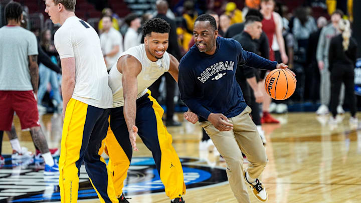 Michigan forward Yaxel Lendeborg (23) warms up with assistant coach Mike Boynton Jr. ahead of the NCAA Tournament Sweet 16 between Michigan and Alabama at United Center in Chicago on Friday, March 27, 2026. Michigan forward Yaxel Lendeborg (23) warms up with assistant coach Mike Boynton Jr. ahead of the NCAA Tournament Sweet 16 between Michigan and Alabama at United Center in Chicago on Friday, March 27, 2026.