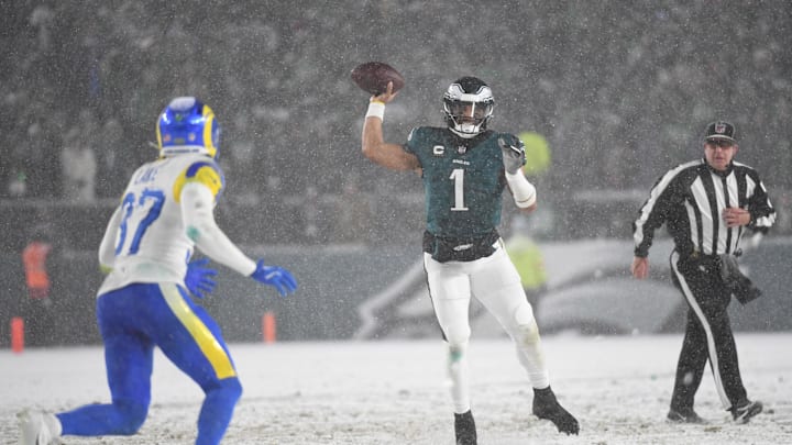 Jan 19, 2025; Philadelphia, Pennsylvania, USA; Philadelphia Eagles quarterback Jalen Hurts (1) throws a pass during the fourth quarter against the Los Angeles Rams in a 2025 NFC divisional round game at Lincoln Financial Field. 