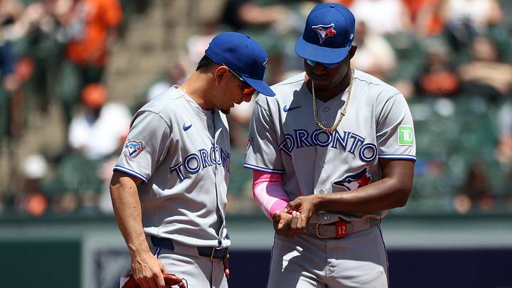 May 31, 2026; Baltimore, Maryland, USA; Toronto Blue Jays right fielder Jesus Sanchez (12) speaks to Blue Jays shortstop Andres Gimenez (0) during the sixth inning after he was hit by a baseball thrown by a fan. May 31, 2026; Baltimore, Maryland, USA; Toronto Blue Jays right fielder Jesus Sanchez (12) speaks to Blue Jays shortstop Andres Gimenez (0) during the sixth inning after he was hit by a baseball thrown by a fan.