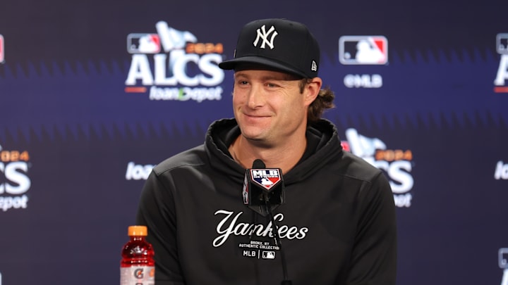 Oct 14, 2024; Bronx, New York, USA; New York Yankees starting pitcher Gerrit Cole (45) speaks to the media before game one of the ALCS against the Cleveland Guardians during the 2024 MLB Playoffs at Yankee Stadium. Mandatory Credit: Brad Penner-Imagn Images