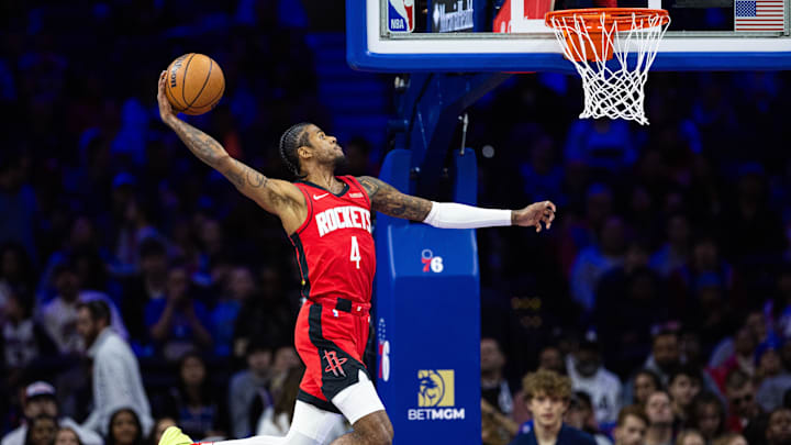 Nov 27, 2024; Philadelphia, Pennsylvania, USA; Houston Rockets guard Jalen Green (4) drives for a dunk against the Philadelphia 76ers during the first quarter at Wells Fargo Center. Mandatory Credit: Bill Streicher-Imagn Images