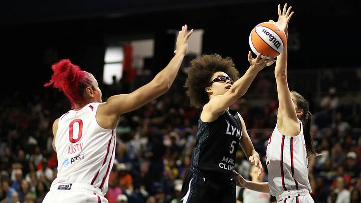 Jun 24, 2026; Washington, District of Columbia, USA; Minnesota Lynx guard Olivia Miles (5) takes a shot over Washington Mystics center Shakira Austin (0) and Washington Mystics guard Sonia Citron (22) during the second half at CareFirst Arena. Mandatory Credit: Daniel Kucin Jr.-Imagn Images Jun 24, 2026; Washington, District of Columbia, USA; Minnesota Lynx guard Olivia Miles (5) takes a shot over Washington Mystics center Shakira Austin (0) and Washington Mystics guard Sonia Citron (22) during the second half at CareFirst Arena. Mandatory Credit: Daniel Kucin Jr.-Imagn Images